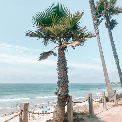Spend sunny days on Mission Beach – a short seven-minute walk away