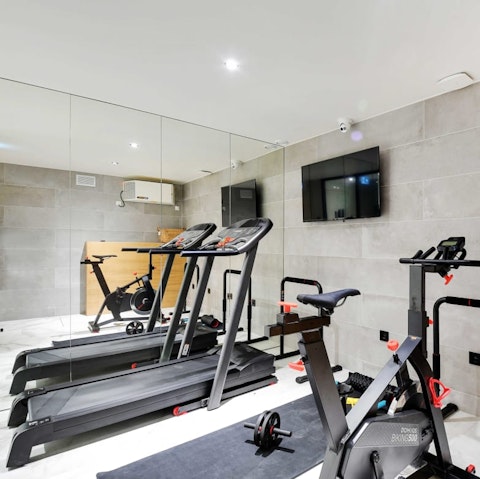 Keep on top of your fitness routine in the building's gym