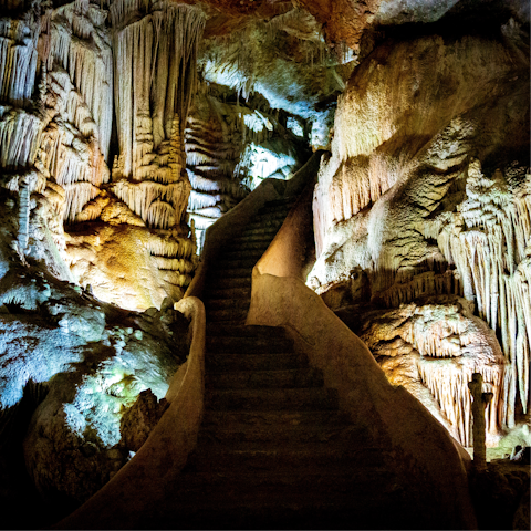 Explore the majestic Caves de Campanet, a short drive away