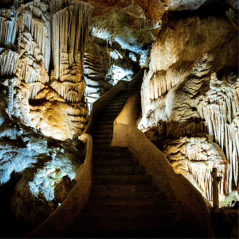 Explore the majestic Caves de Campanet, a short drive away