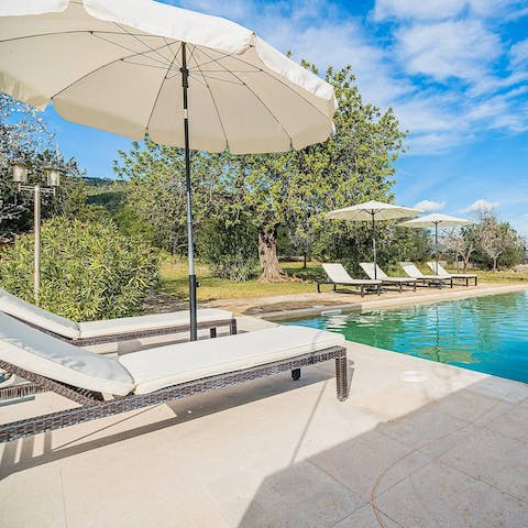 Let the sun dry you off naturally after a swim in the private pool