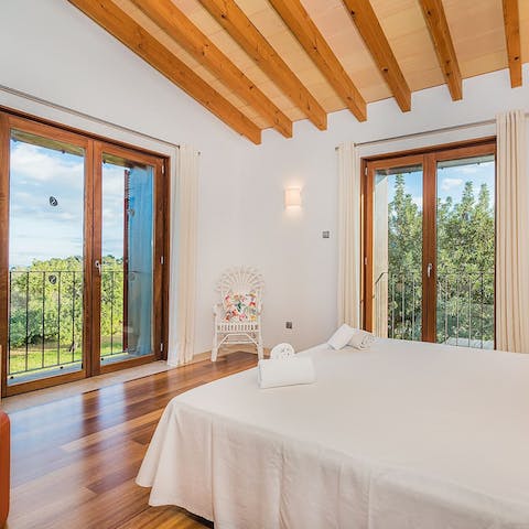 Admire expansive views from the Juliet balconies in the bedroom