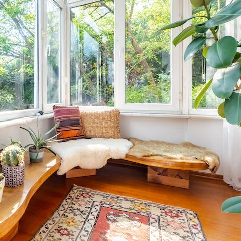 Unwind with a cool raki cocktail in the air-conditioned living room