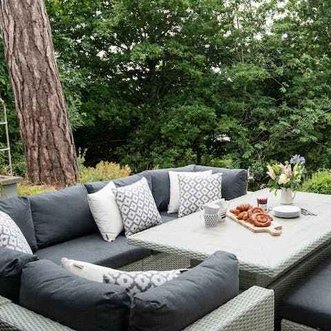 Start your day with breakfast in the lush garden's lounge area