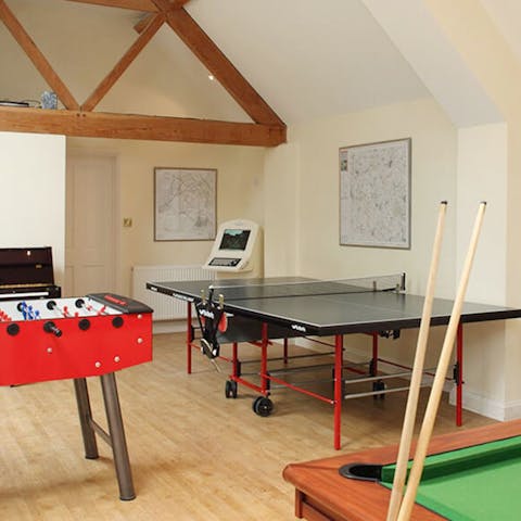Bond with your loved ones over a round of table tennis in the games room