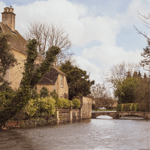 Enjoy a leisurely stroll around Bourton-on-the-Water, twenty minutes away