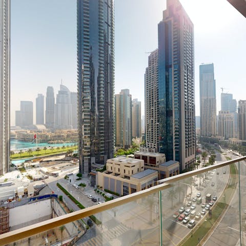 Sip coffee on the private balcony as you drink in the city views