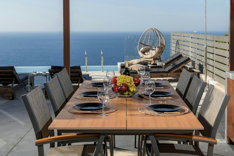 Share open-air meals with sweeping views across the sea