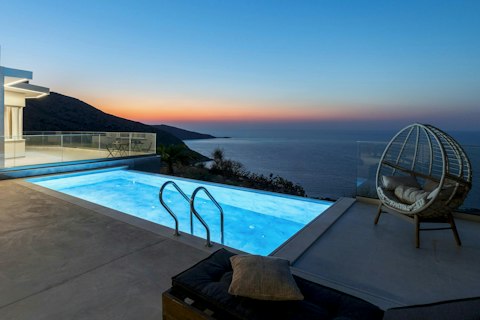 Take an evening swim looking out over the sea