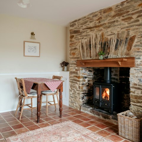 Get cosy in front of the lounge's woodburner