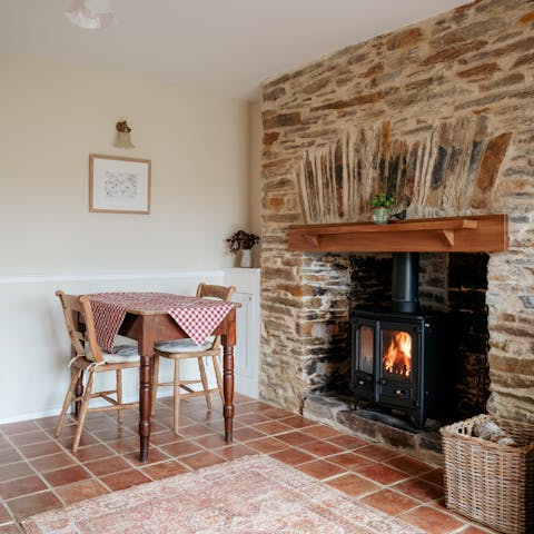 Get cosy in front of the lounge's woodburner