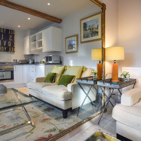 Catch admiring glances in the huge antique mirror