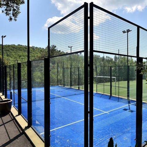 Play padel tennis with loved ones on the communal court