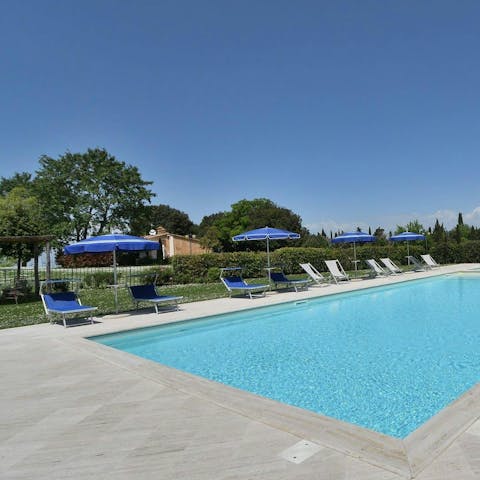 Enjoy a refreshing dip in the shared swimming pool