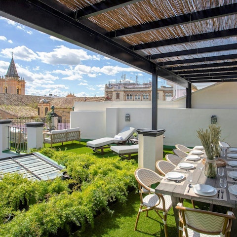 Set the table on the rooftop terrace for dinner with a view