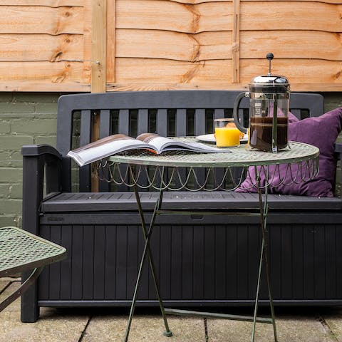 Relax outside on the private patio during the warmer months