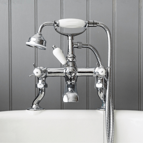 Pour yourself a luxurious bubble bath in the freestanding tub and soak your stress away