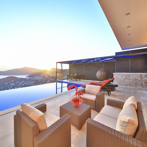 Watch the sunset over whiskey and conversation