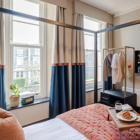 Enjoy a lazy morning with coffee and croissant in bed