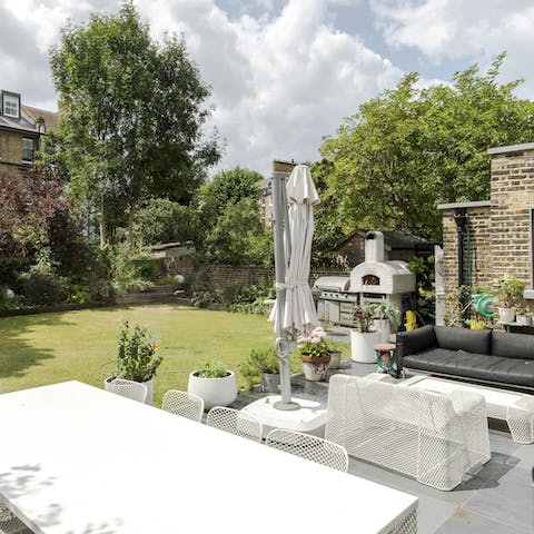 Fire up the pizza oven or the barbecue — or both — for an alfresco feast