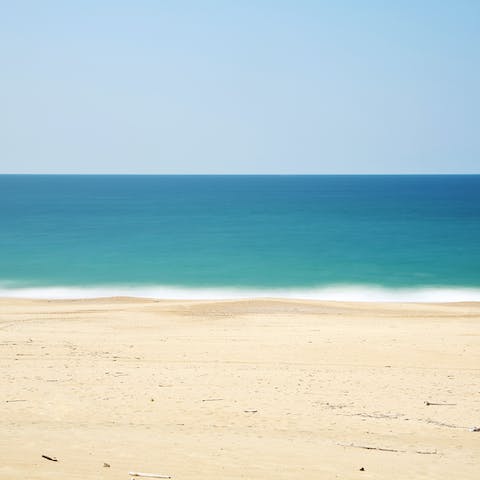 Spend days on the nearby sandy beach – roughly a two-minute walk away