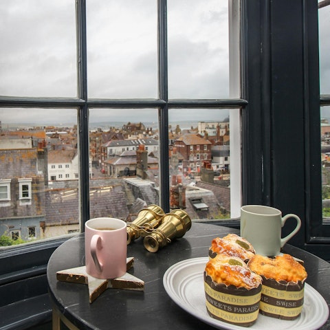 Enjoy a morning coffee while admiring the sea views