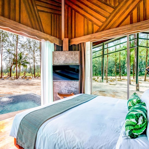 Slide open the doors and soak up the view from the comfort of your bed