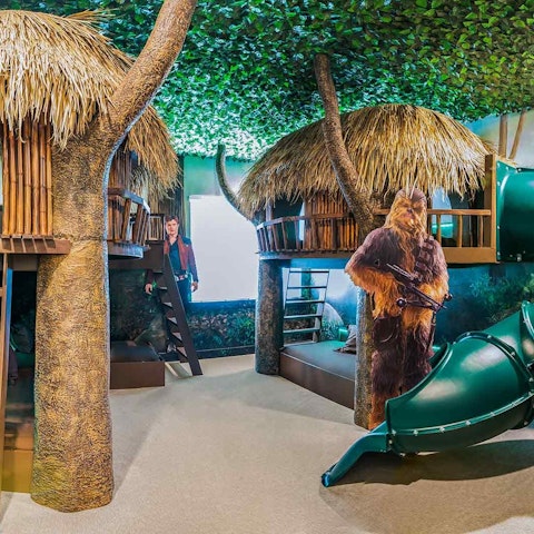 Let little ones run loose in the galaxy-themed bedroom