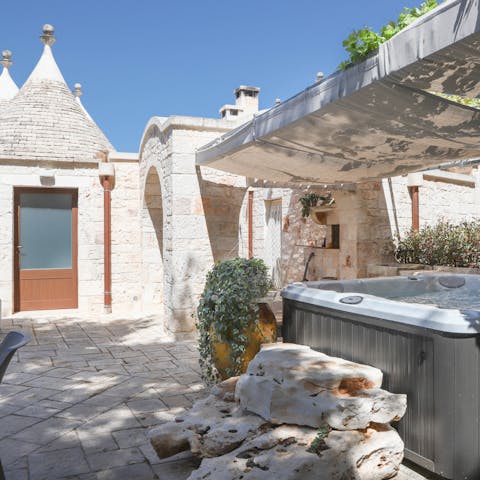 Make sundowners in the shared hot tub the new routine