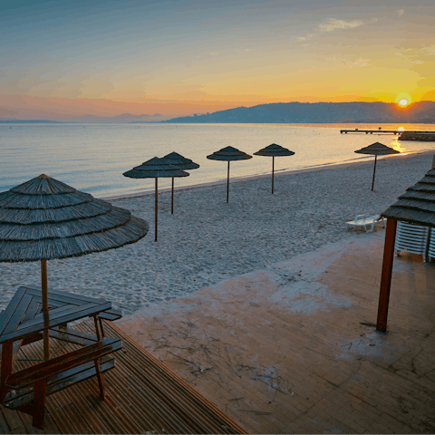 Watch the sunset from the sand at nearby Juan-Les-Pins