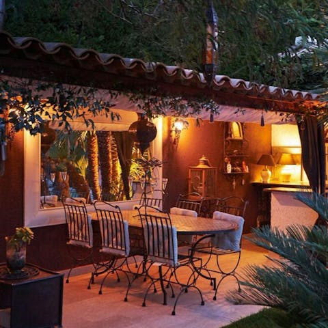 Dine alfresco on the moonlit terrace