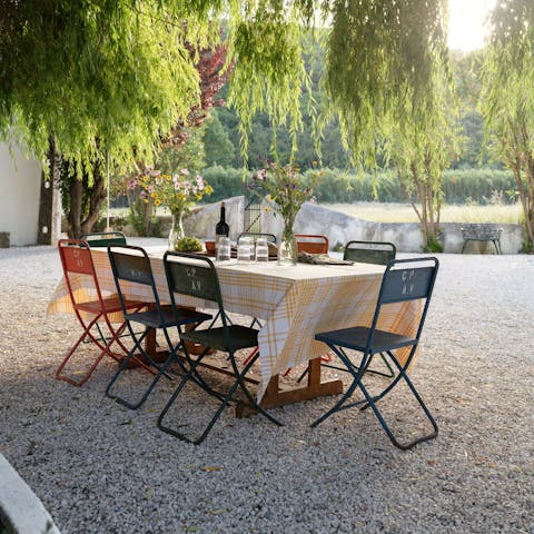 Gather for delicious Portuguese meals served in the garden
