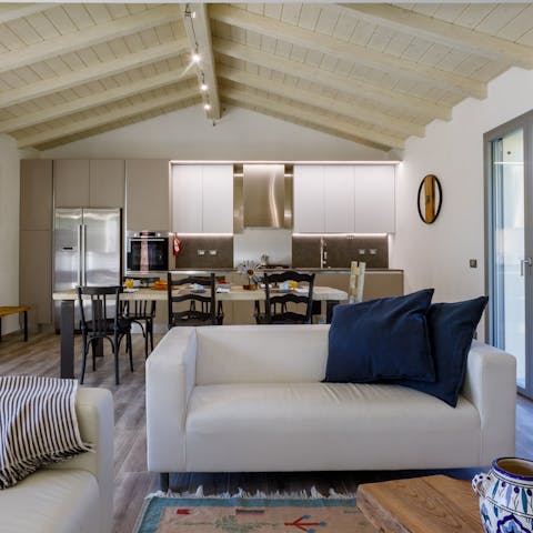 Kick back in the open-plan living room when the sun gets too hot