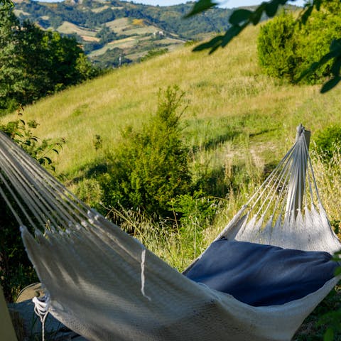 Hang out in the shaded hammock with a good book and a cold drink
