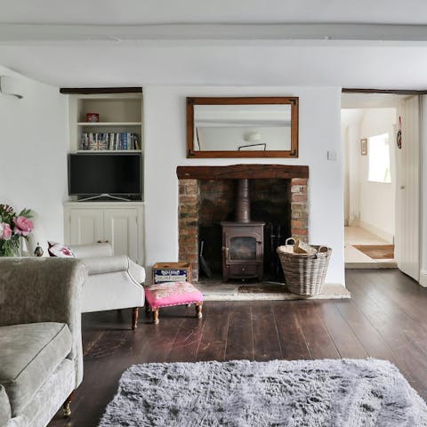 Savour evening drinks and conversation by the fire