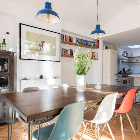 Dine in style on Eames chairs and large dining area