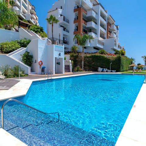 Spend lazy afternoons floating about in the communal pool