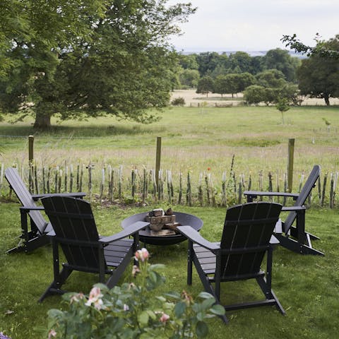 Gather around the firepit as the evening draws to a close