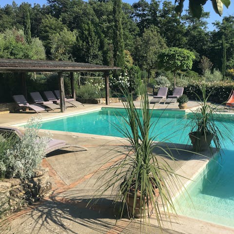 Swim in the private pool while the kids play on the swings