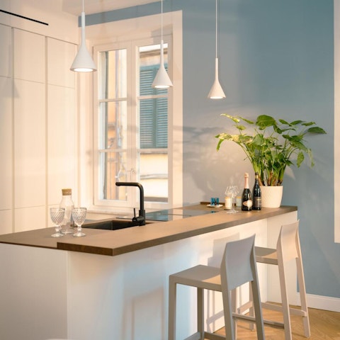 Cook up meals with friends in the designer kitchen