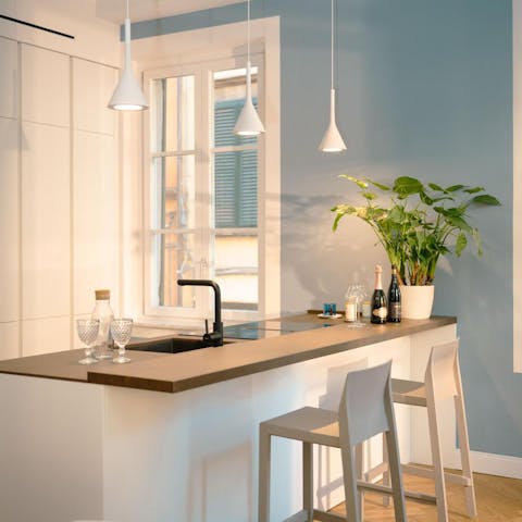 Cook up meals with friends in the designer kitchen