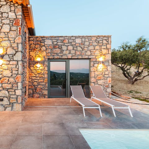 Take in a sunset from one of the comfy sun loungers