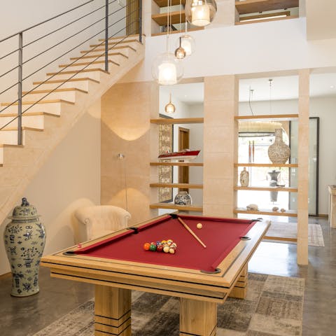 Play a game of pool after having a stroll among the olive and almond groves