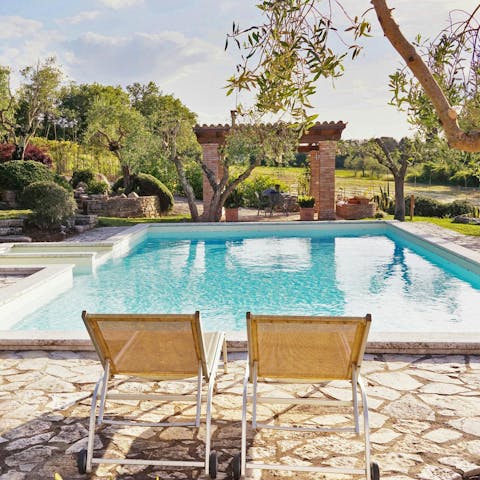 Unwind by the private pool, surrounded by nature