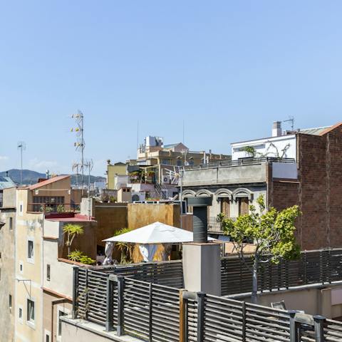 Admire the eclectic mix of architecture from your rooftop vantage point