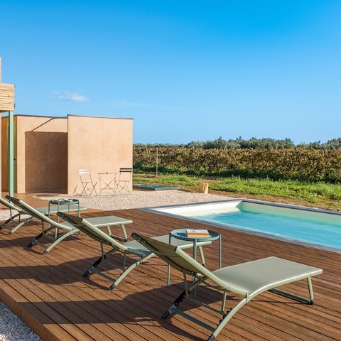 Bask in the Sicilian sun while sipping a cocktail