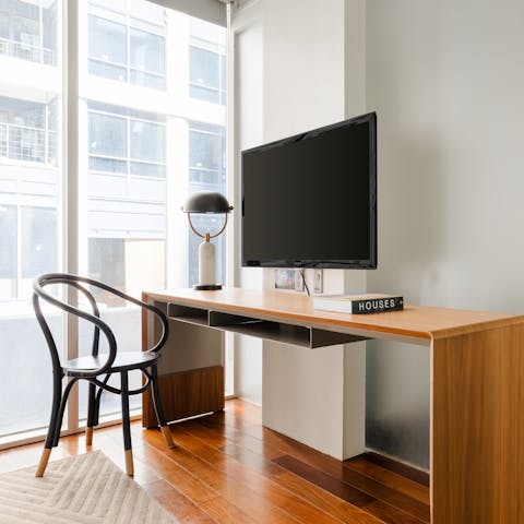 Set up your laptop at the desk and work remotely with ease