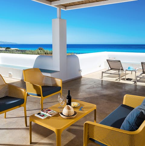 Share a bottle of Barolo wine and mozzarella under the pergola