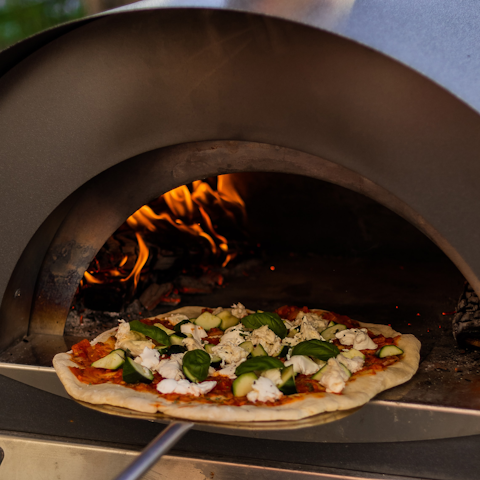 Cook your own custom pizzas in the pizza oven