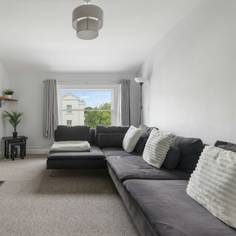 Relax, unwind and watch a movie in the living room